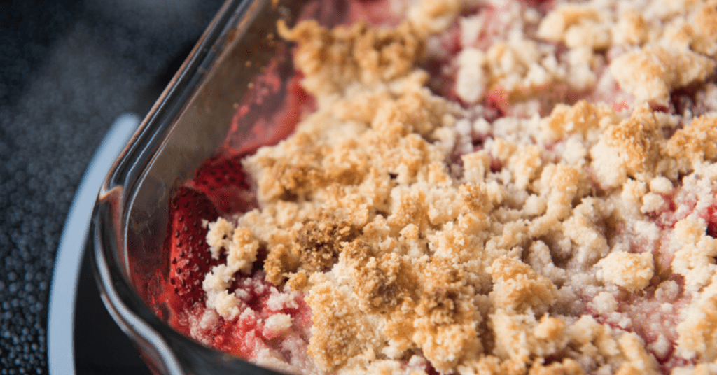 Strawberry Cobbler in a glass baking dish. 