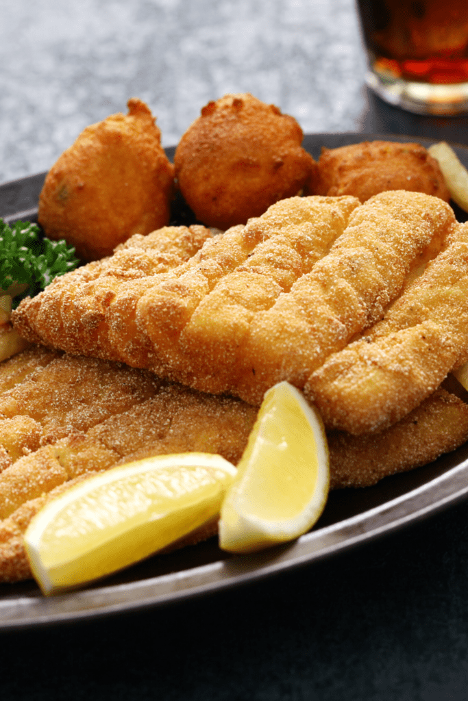 Fried Catfish With Lemons and Hushpuppies