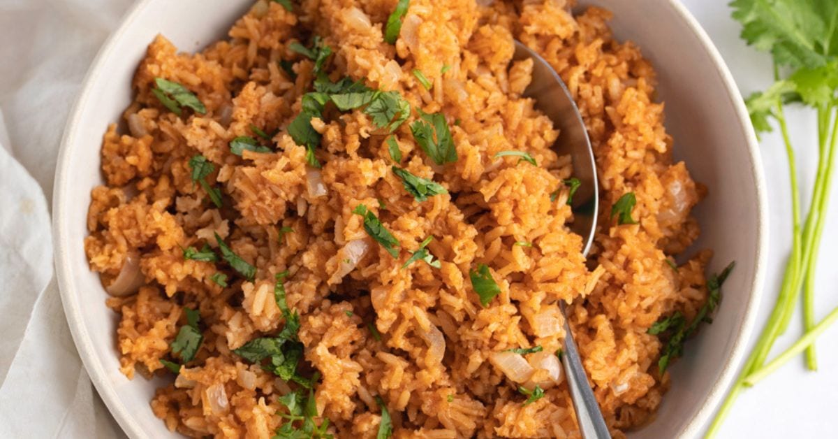Bowl of Rich and Flavorful Mexican Rice with Herbs