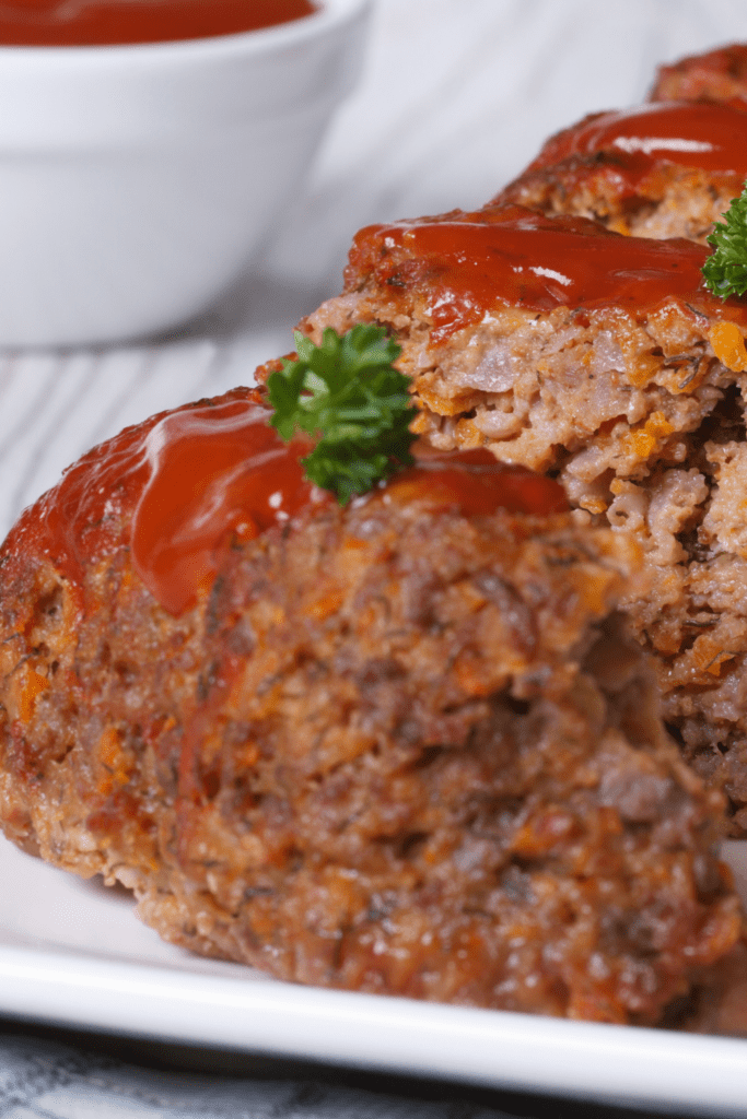 Sliced Meatloaf With Ketchup And Parsely