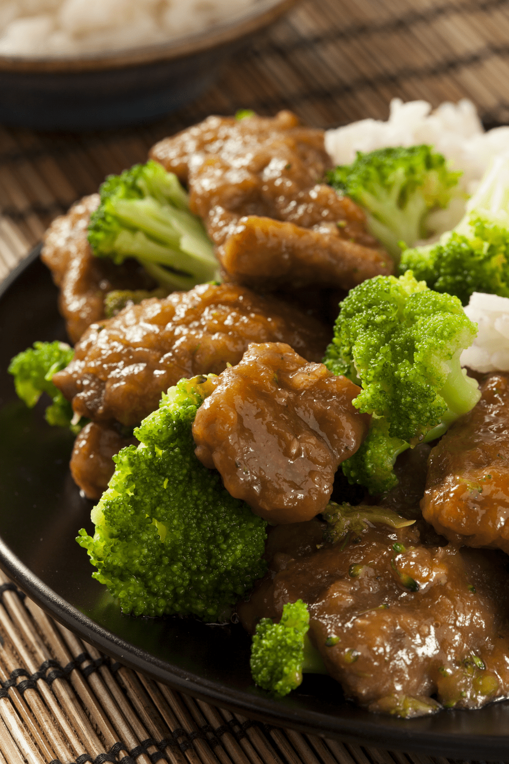Homemade Beef Broccoli and Rice in a Black Plate