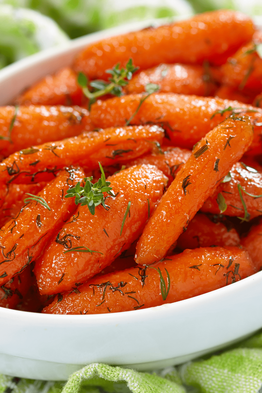 Glazed Baby Carrots with Parsley on a bowl. 