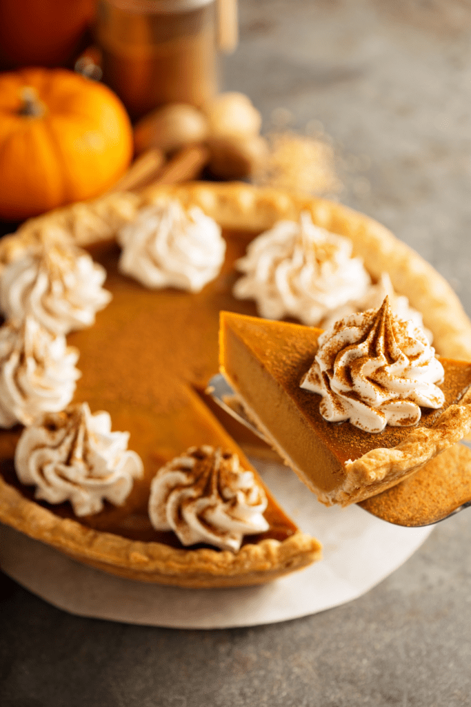 Pumpkin Pie with Cinnamon  and Whipped Cream