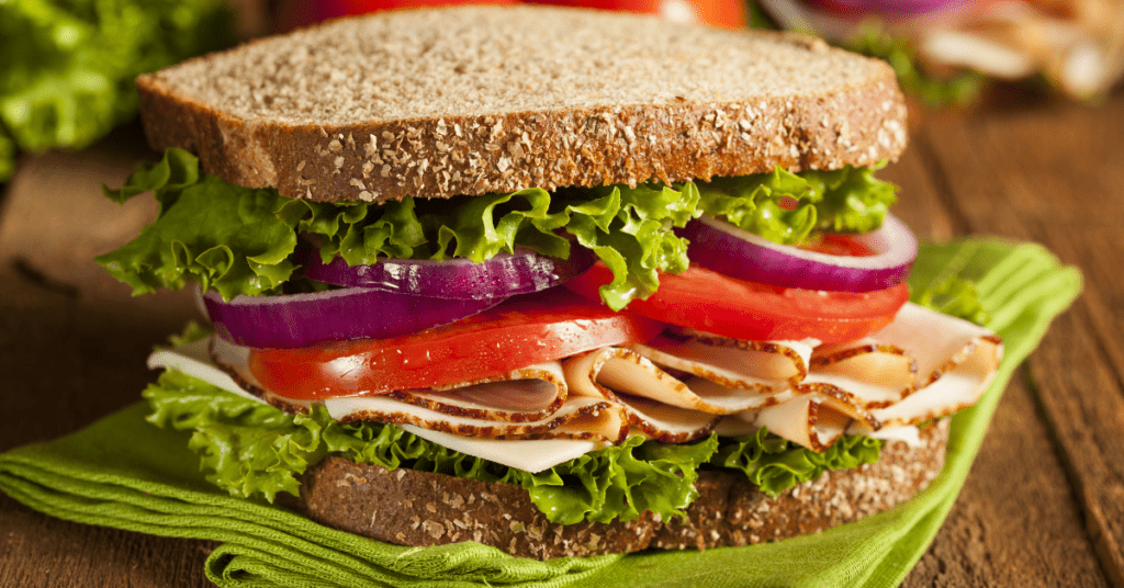 Turkey Sandwich with Tomatoes, Lettuce and Onions - Picnic Food Ideas