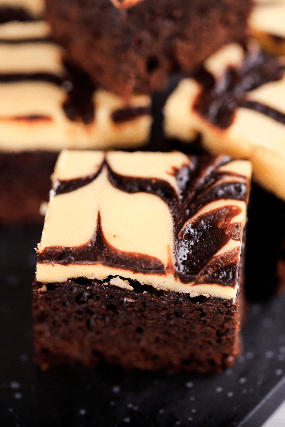 Slice of cheesecake brownie swirl.
