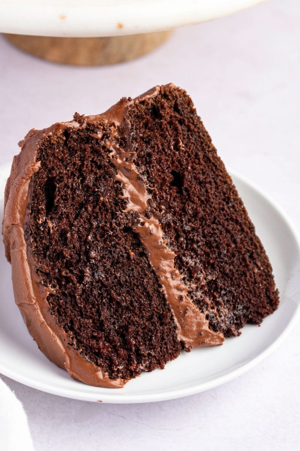 Slice of Hershey's Chocolate Cake, Close-up shot showing moist cake and chocolate frosting