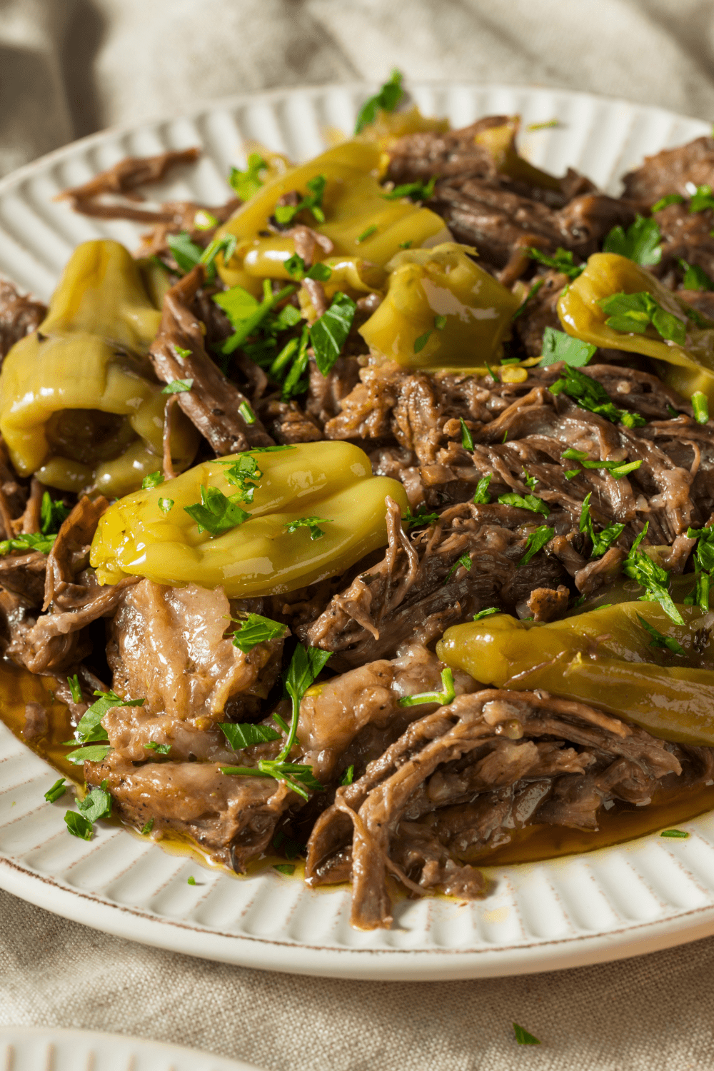 Roasted Mississippi Pot Roast serving on a plate. 