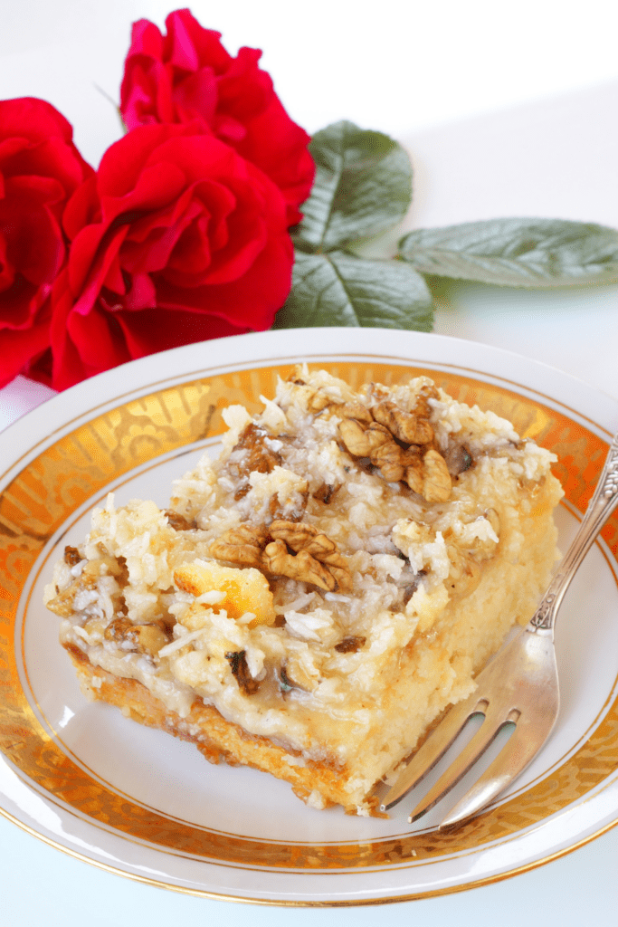 Slice of Cake with Walnuts and Coconut Icing