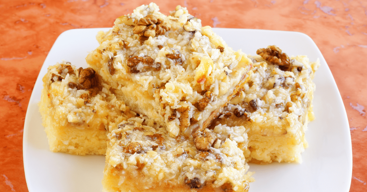 Slices of Cakes with Walnuts and Coconut Icing