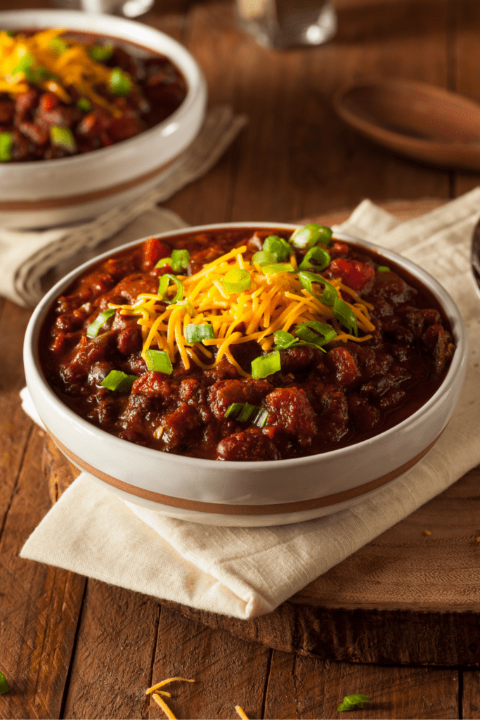 Homemade Bowl of Chili with Cheese, Ground Beef, Beans and Onions