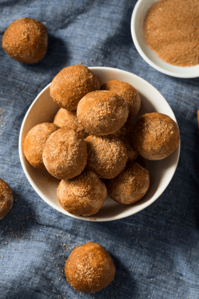 Homemade Cinnamon Bisquick Donuts in a White Bowl