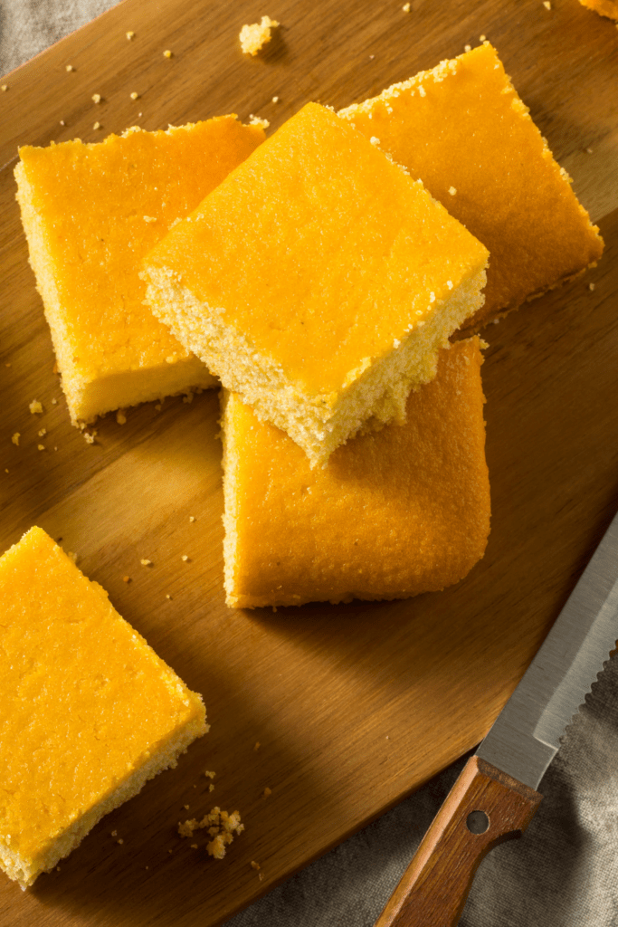 Moist Cornbread Stacked on a Wooden Chop Board