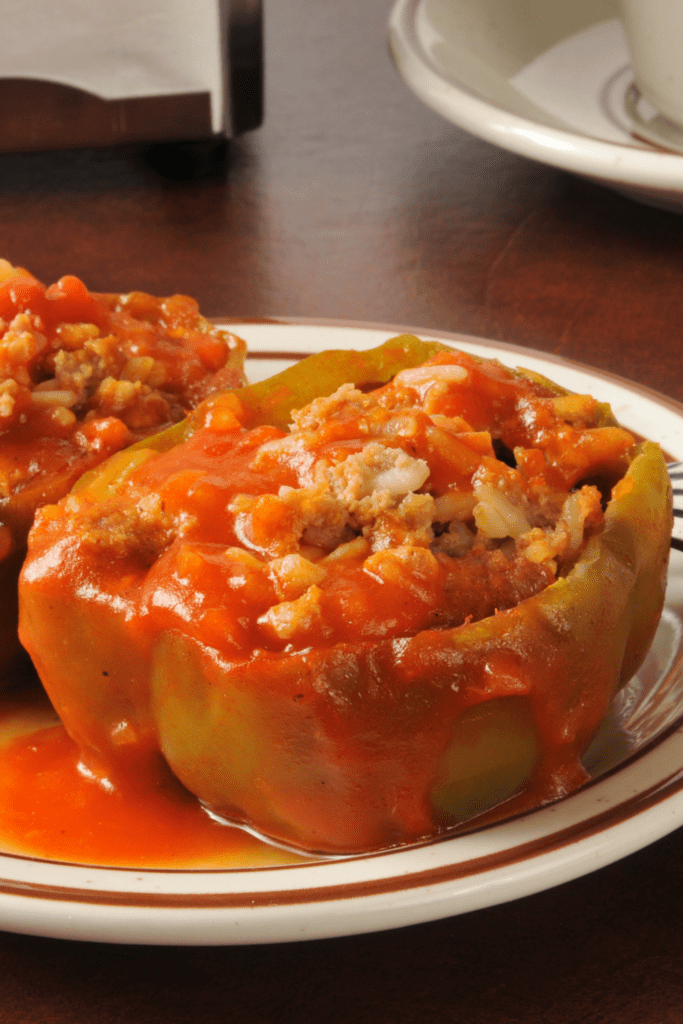 Stuffed Bell Peppers with Ground Beef Rice and Tomato Sauce