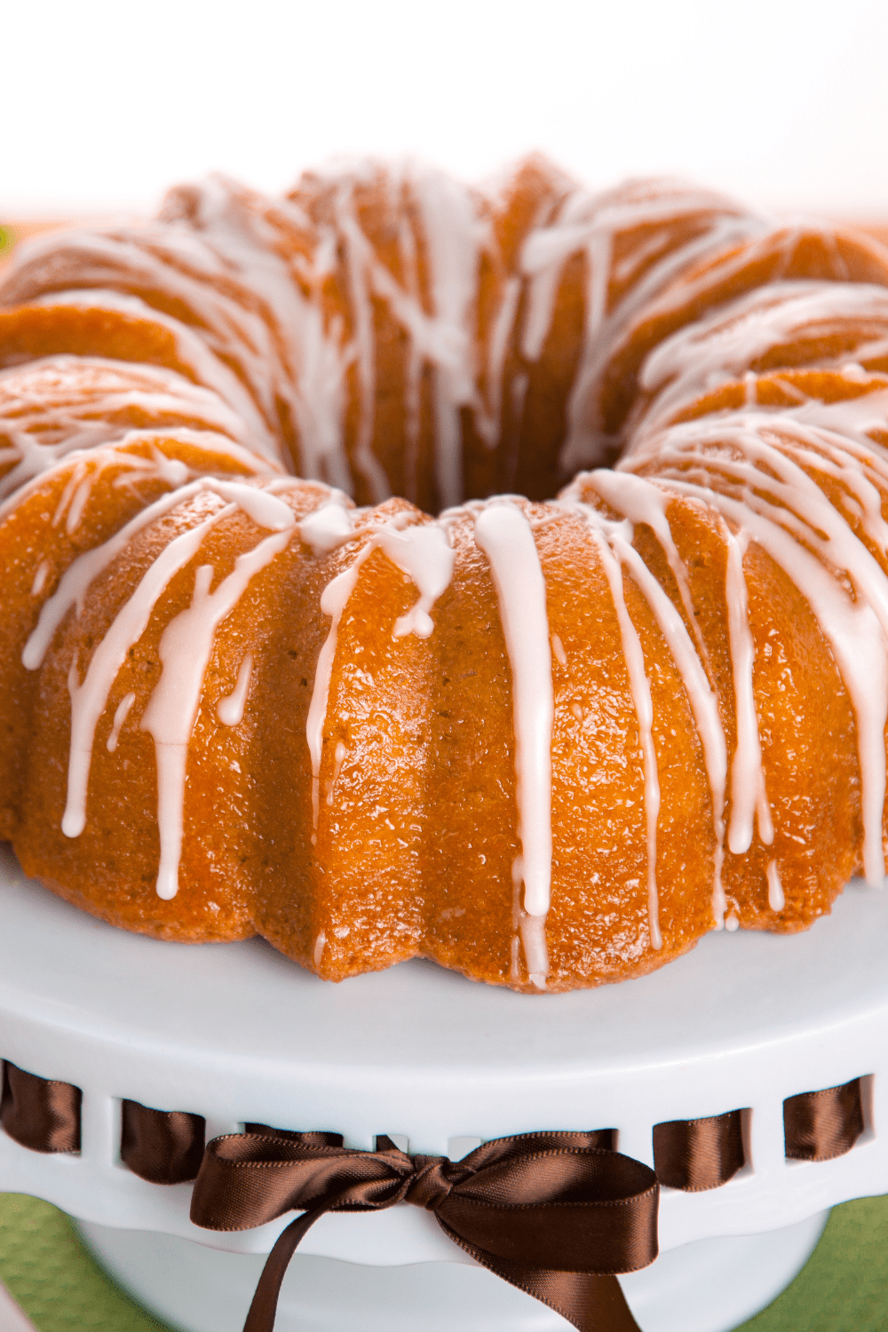 Bundt cake with dripping sugar glaze on top. 