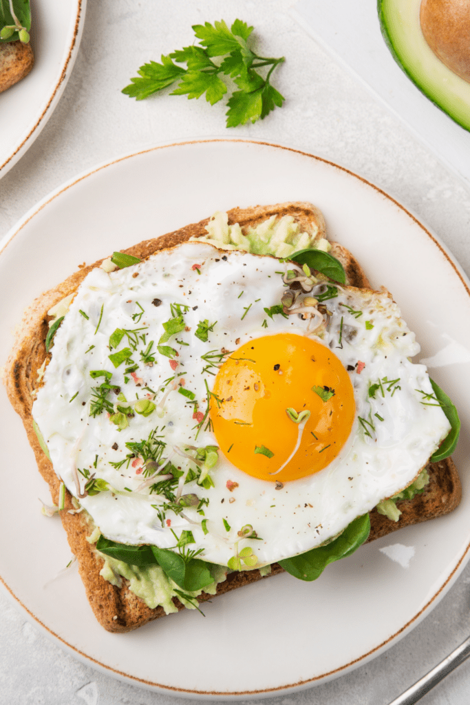 Homemade Avocado Toast with Fried Egg and Spinach