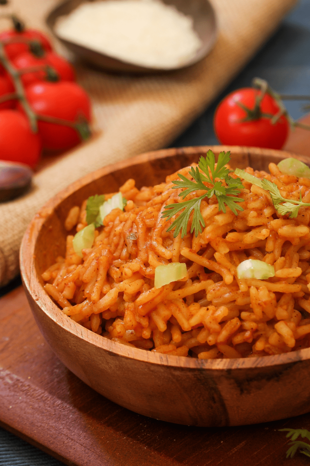 A wooden bowl full of seasoned rice.