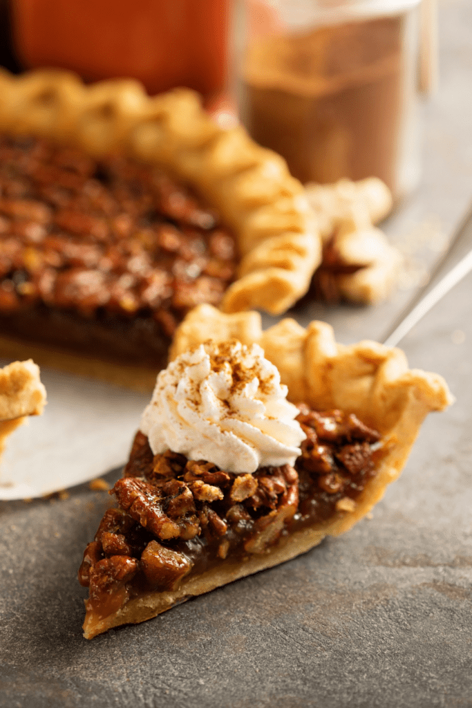 Sliced Pecan Pie with Whipped Cream