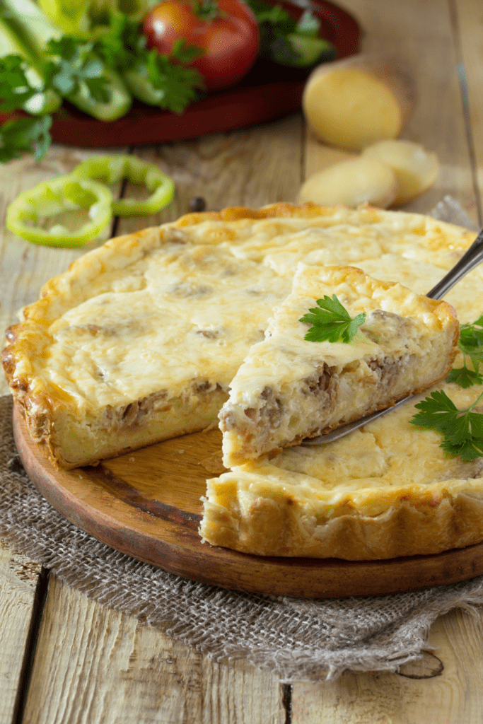 Breakfast Quiche Stuffed with Meat, Potatoes and Cheese