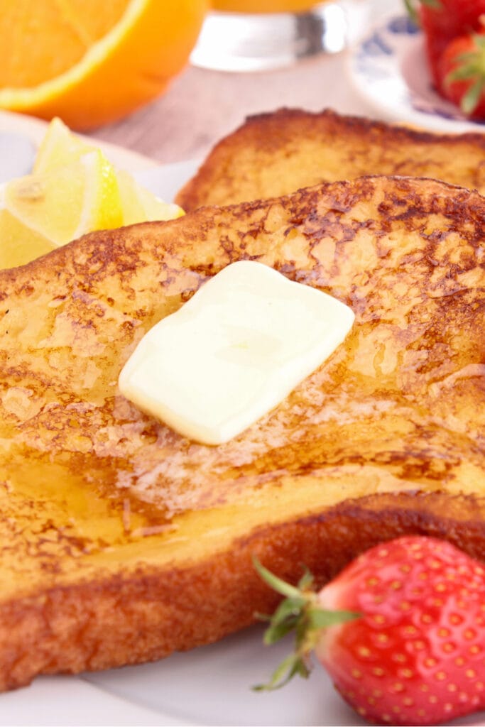 French Toast with Butter and Strawberries