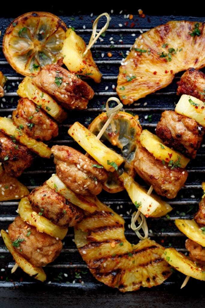 33 Easy BBQ Recipes featuring Grilled BBQ Skewers with Lemons and Pineapple Pin