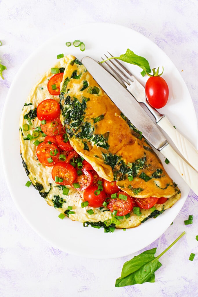 Omelets with Tomatoes, Onions and Spinach