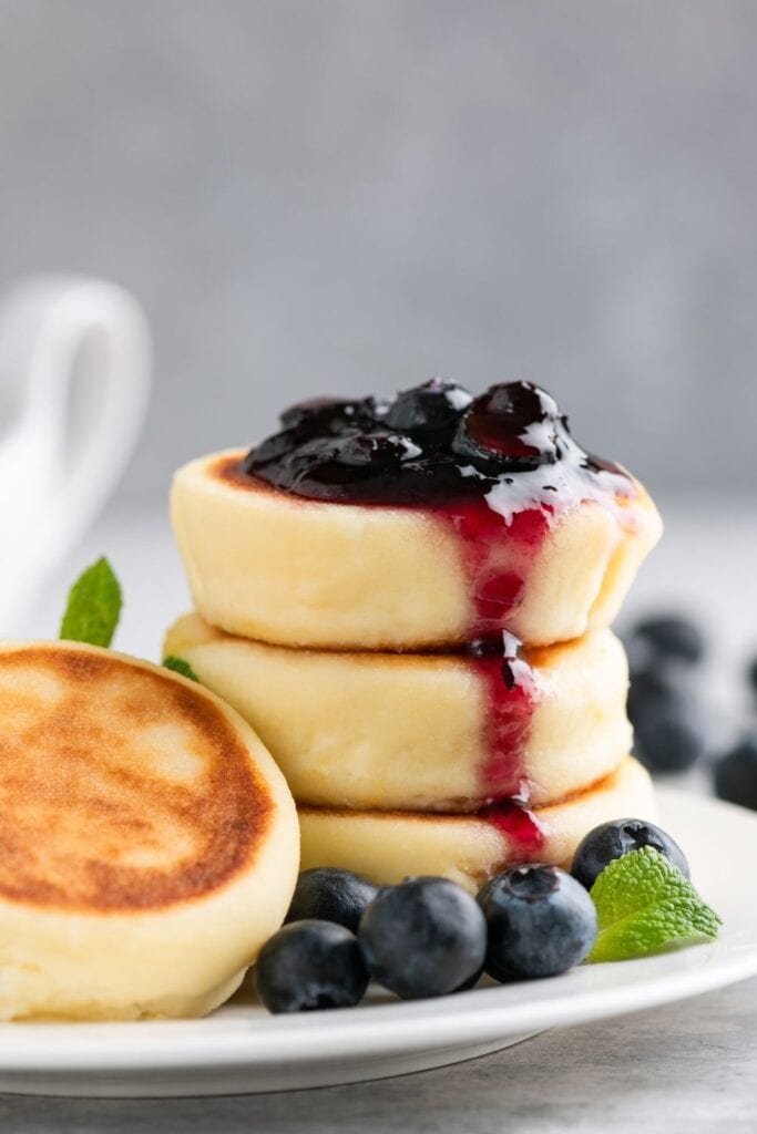 Snyrniki or Cheese Pancakes with Blueberry Jam