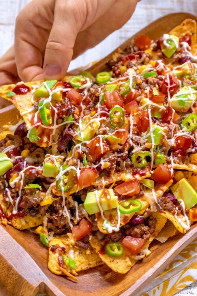 Spicy Nachos with Meat, Cabbage, Avocado and Tomatoes