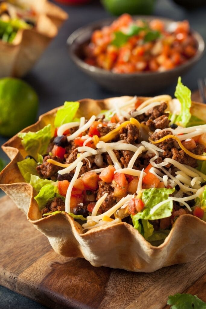 Taco Salad in a Tortilla Bowl with Cheese and Lettuce