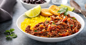 Flank Steak with Fried Plantains, Lime and Black Beans