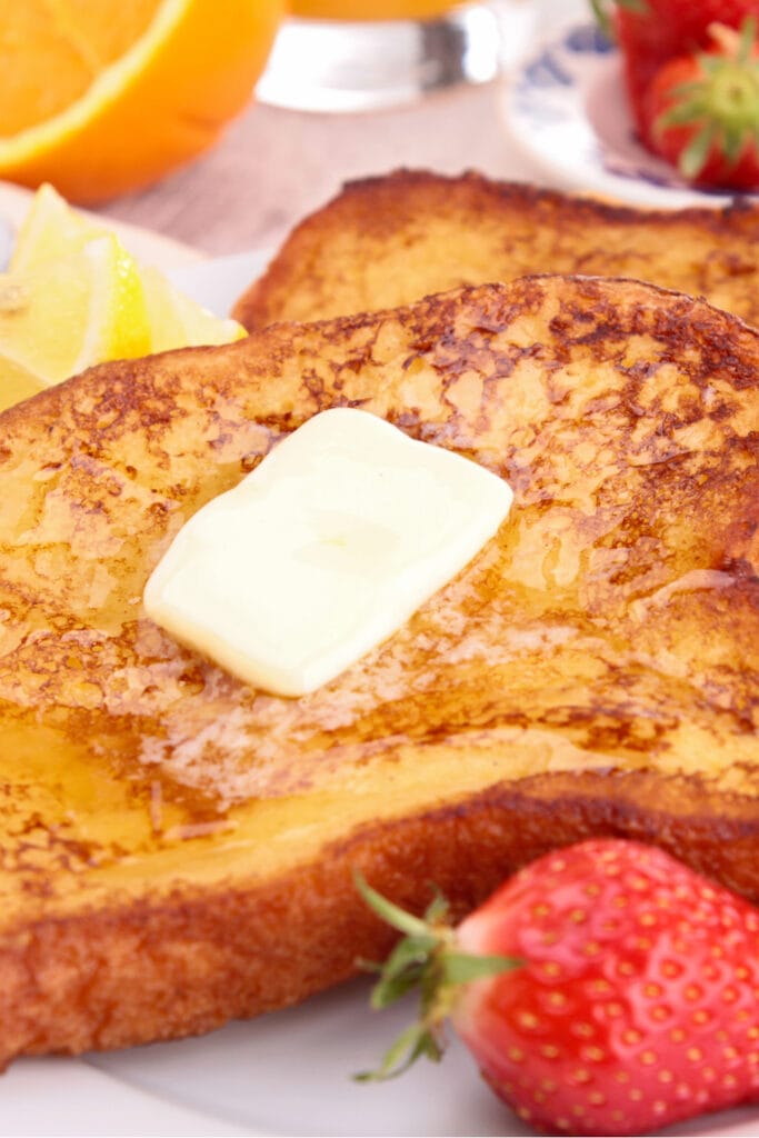 French Toast with Butter and Strawberries