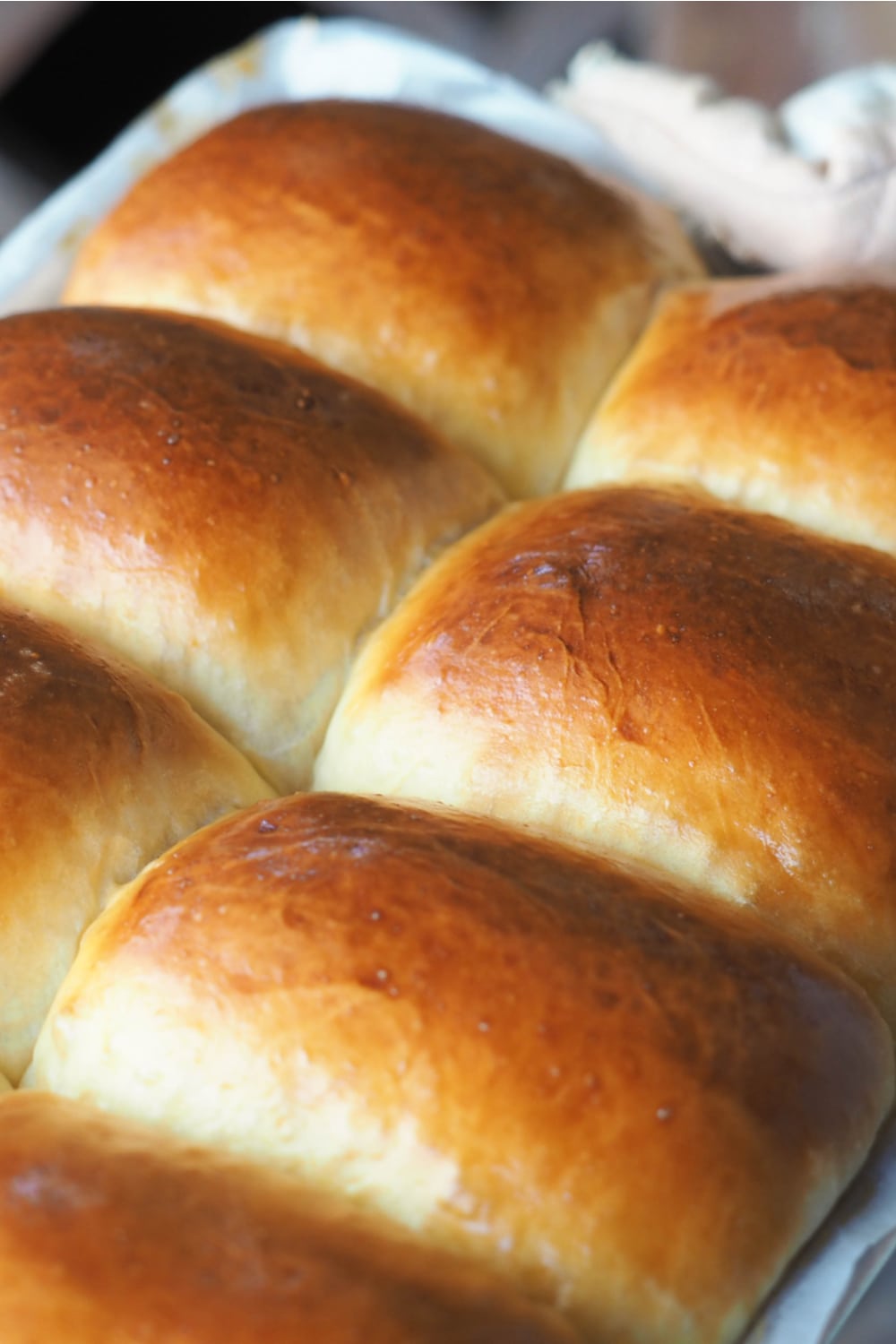 Bread rolls on a wooden board. 