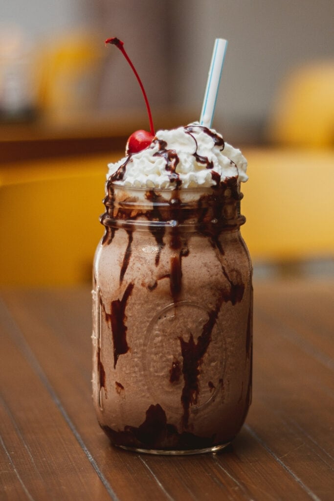 Homemade Chocolate Shake with Cherry Topping and Whipped Cream