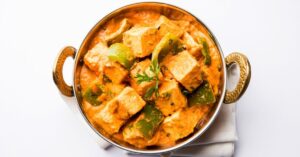 Bowl of Achari or Malai Paneer