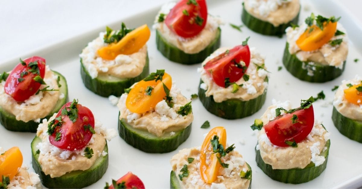 Cucumber Bites Topped with Hummus and Cherry Tomatoes