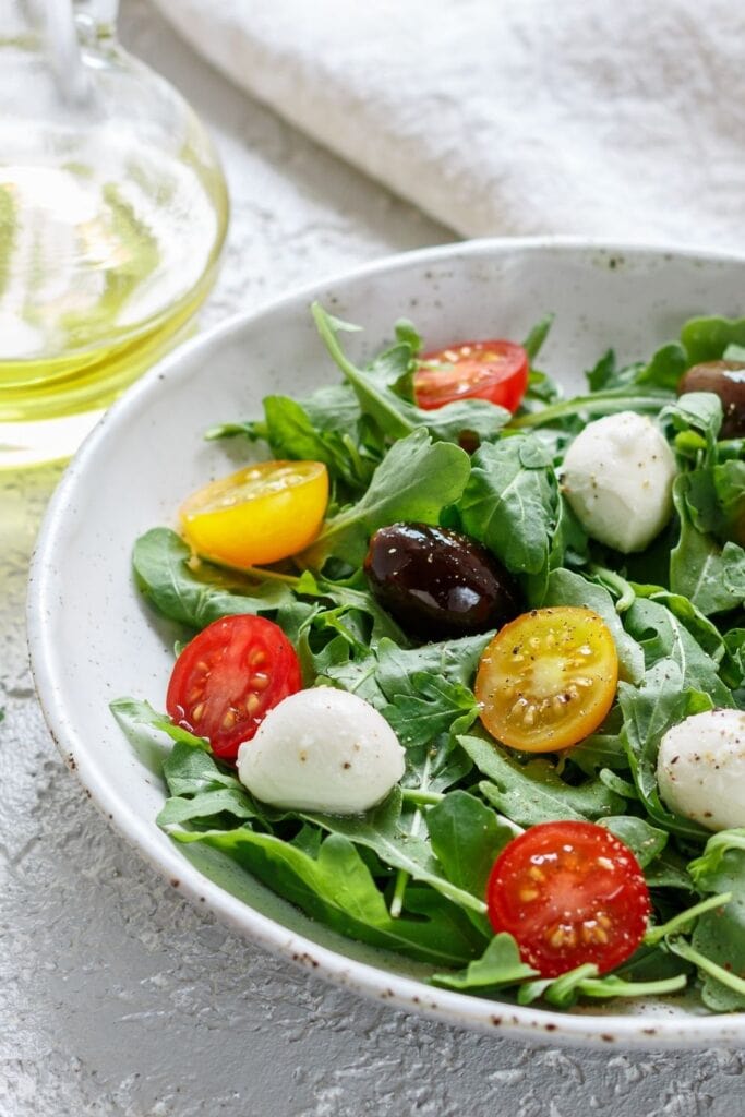 Vegetable Salad with Cherry Tomatoes, Olives and Mozzarella