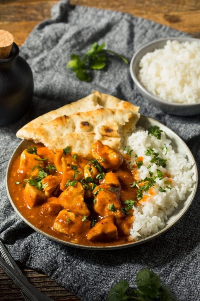 Homemade Butter Chicken with Naan Bread and Rice