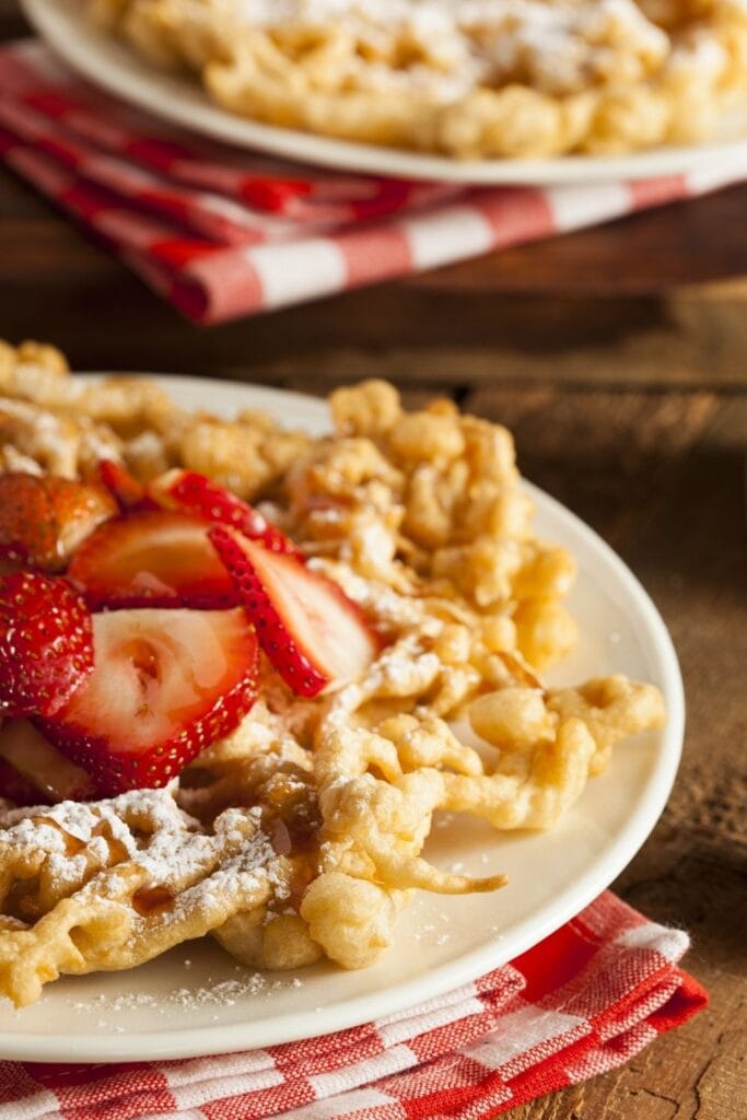 Funnel Cakes with Strawberry and Powedered Sugar - State Fair Foods
