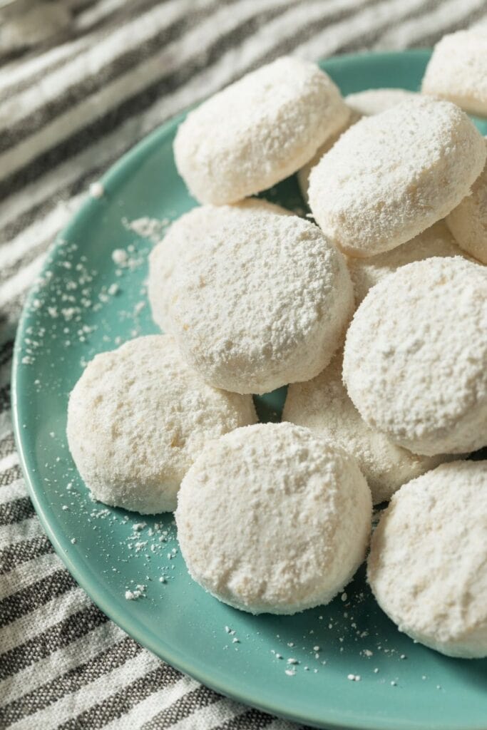 Italian Wedding Cookies on a Green Plate