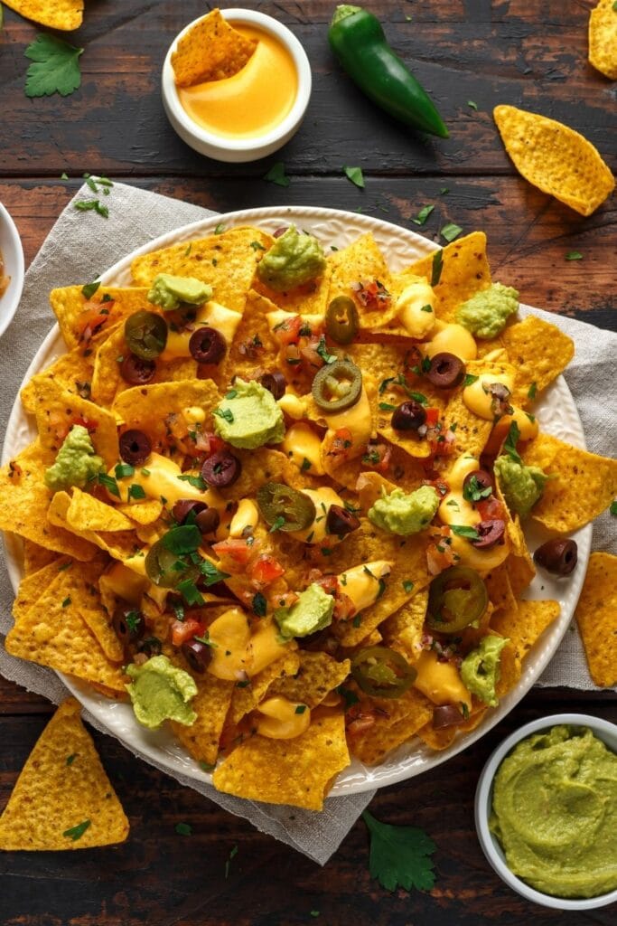 Mexican Nachos with Tortillas, Guacamole and Jalapeno