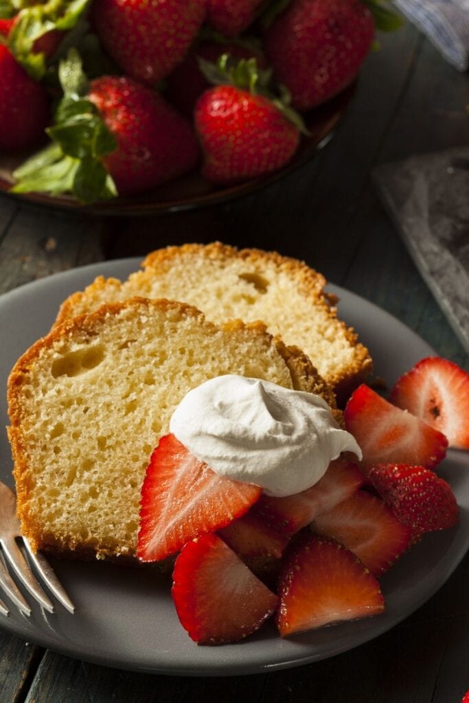 Slices of Pound Cake with Strawberries and Whipped Cream