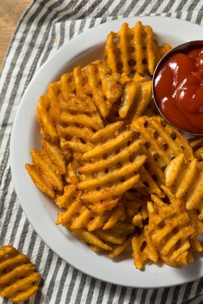 Waffle Fries with Ketchup on a Plate