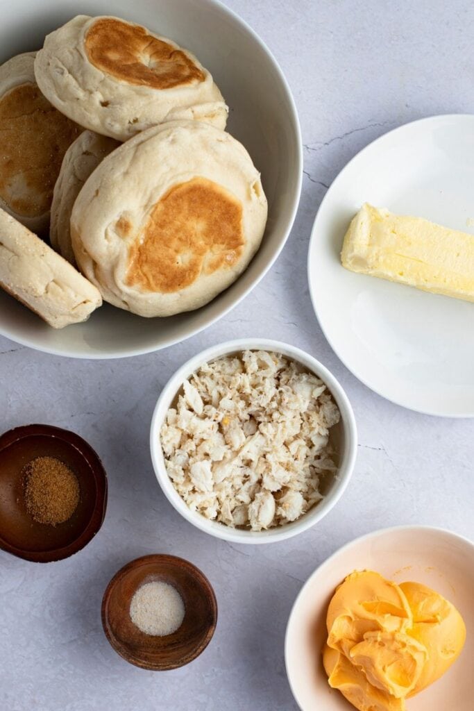 English muffins, butter, and crab meat