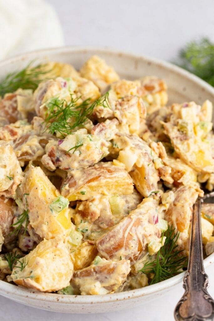 Creamy Potato Salad with Thyme in a Bowl