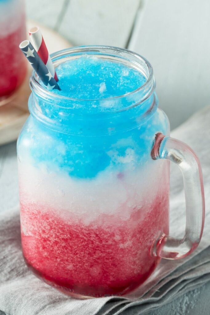 Red, Blue and White Slushie Vodka Cocktail with Patriotic Straws