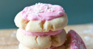 Sugar Cookies with Pink Frosting and Sprinkled Candies
