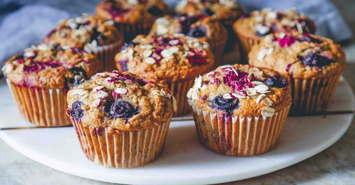 Homemade Gluten Free Banana Oatmeal Muffins with Mixed Berries