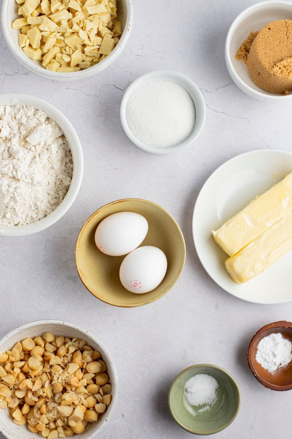 White Chocolate Macadamia Nut Cookies Ingredients: Butter, Brown Sugar, Eggs, Flour, Baking Soda, Chopped Macadamia Nuts, White Chocolate