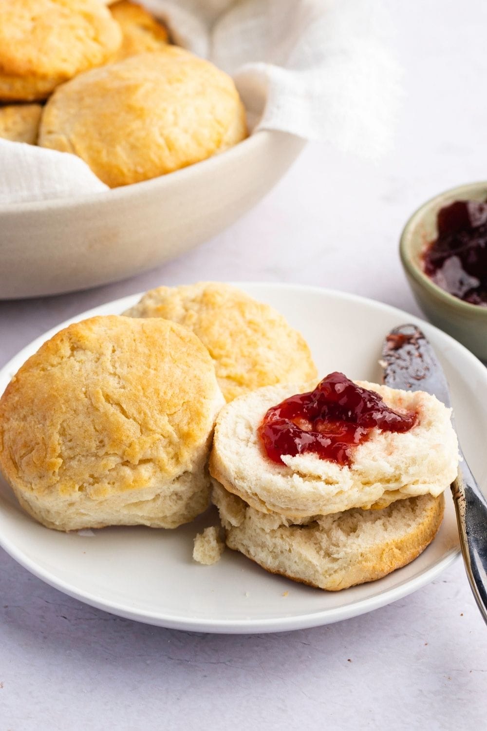 Buttermilk biscuits with jam spread on top. 
