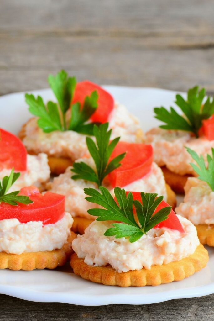 Appetizing Ritz Cracker with Cream Cheese and Tomatoes