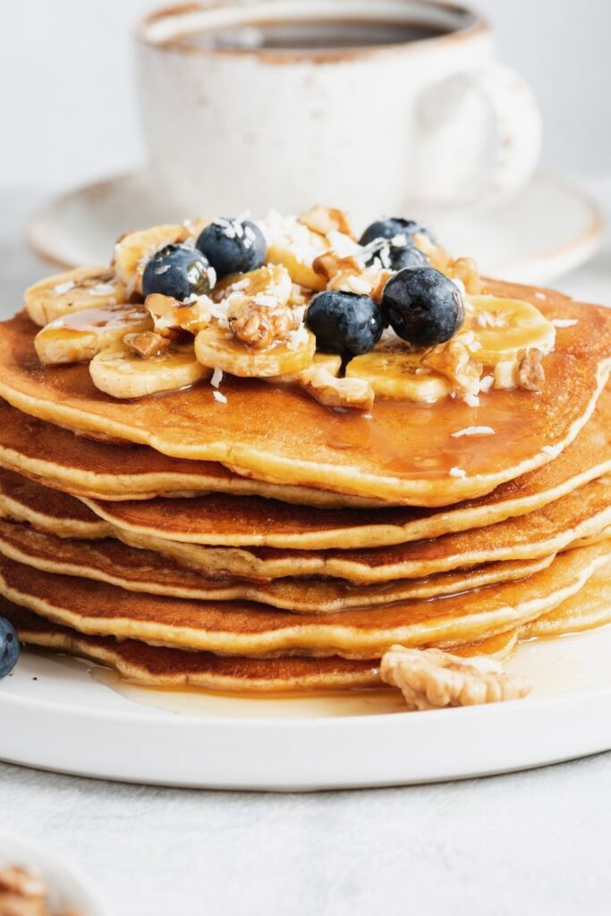 Banana Pancakes with Banana Slices and Blueberries